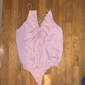 Body suit with lacy front